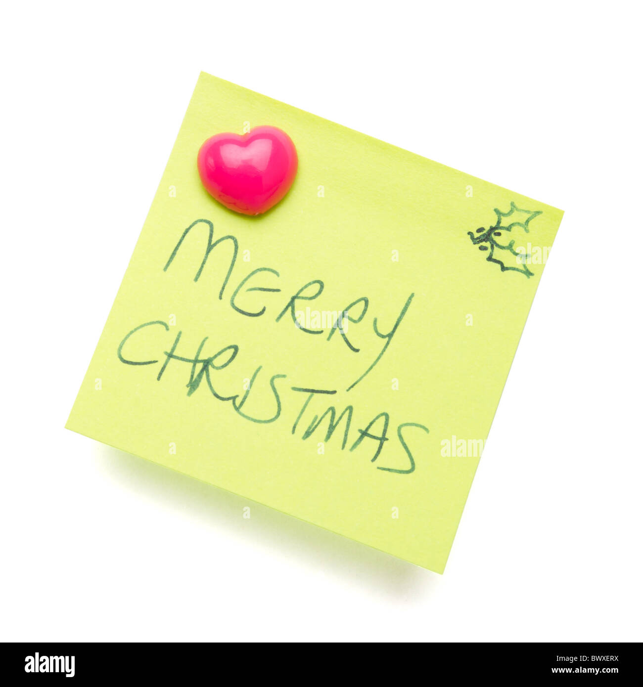 Messaggio di Buon Natale su post-it isolato su bianco. Foto Stock