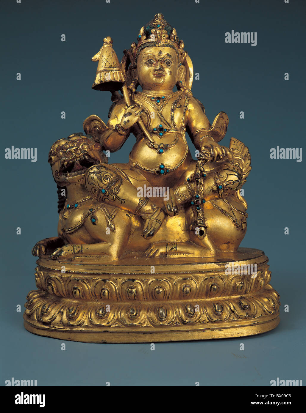 Oro dio dorato della statua della Fortuna, Tibet, Cina Foto Stock