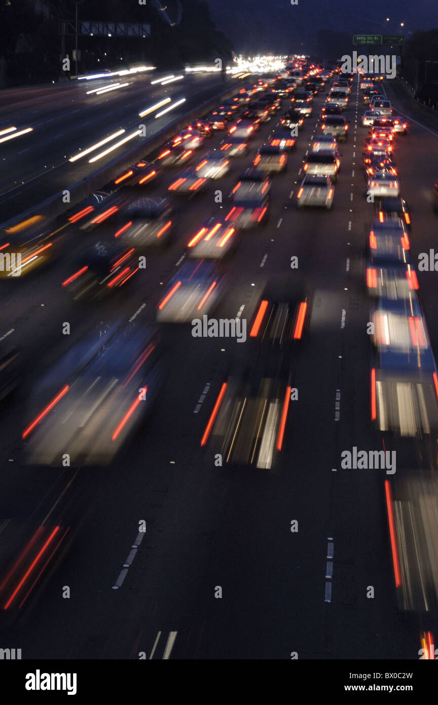 Automobile automobile Autostrada dinamismo Freeway inquinamento atmosferico notte al passeggero di notte auto auto automobile retro li Foto Stock