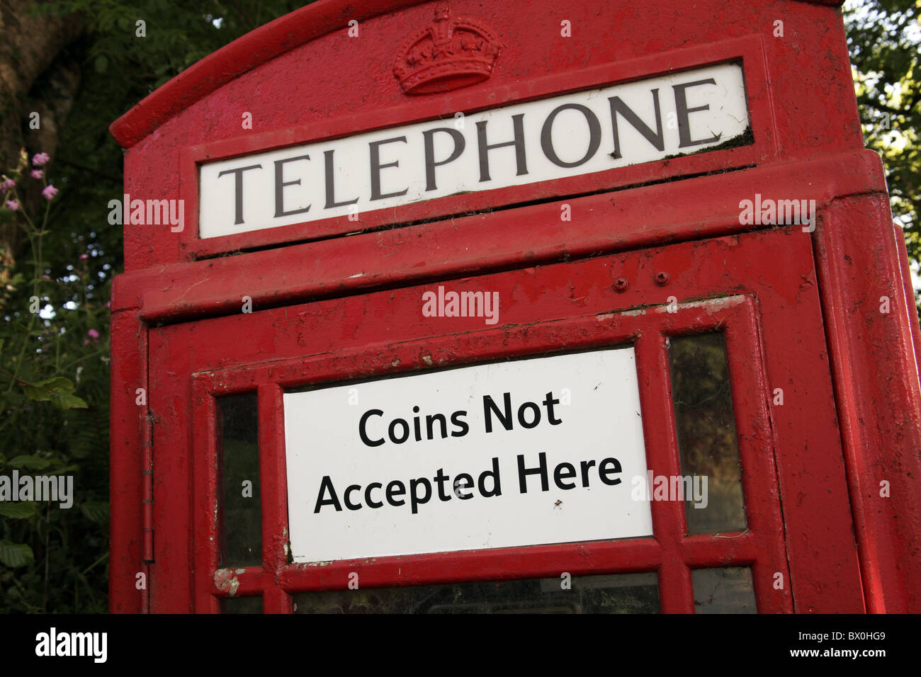 Monete non accettato qui segno rosso sulla scatola del telefono Foto Stock