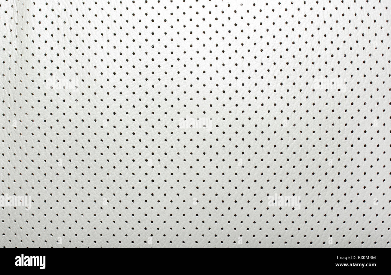 Alta qualità traforato in cuoio beige. Interno della moderna vettura giapponese. Sfondo o sfondo. Foto Stock