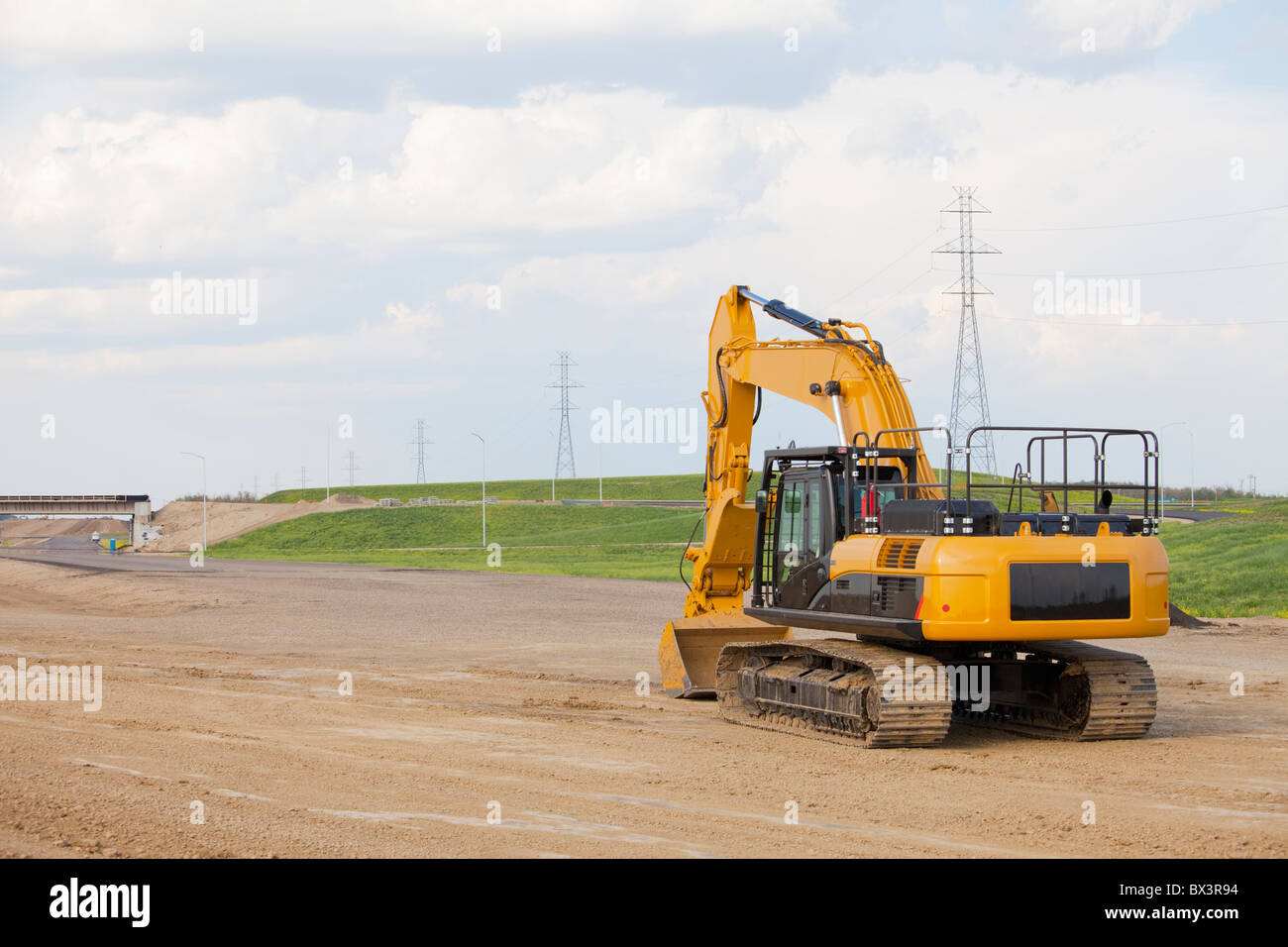 Strada in costruzione utilizzando un cucchiaio rovescio; Edmonton, Alberta, Canada Foto Stock