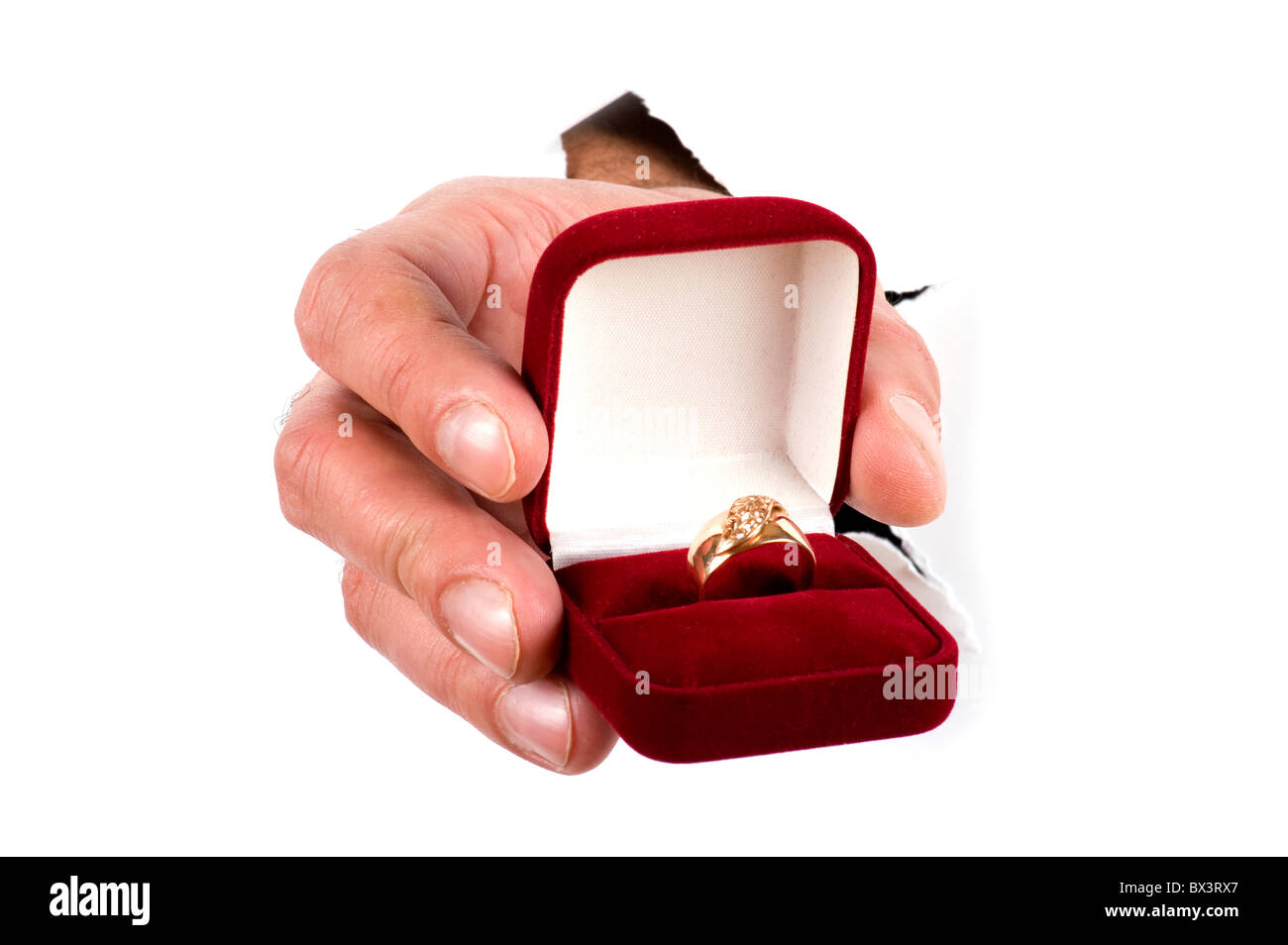 Oggetto su bianco - anello d'oro per la mano Foto Stock