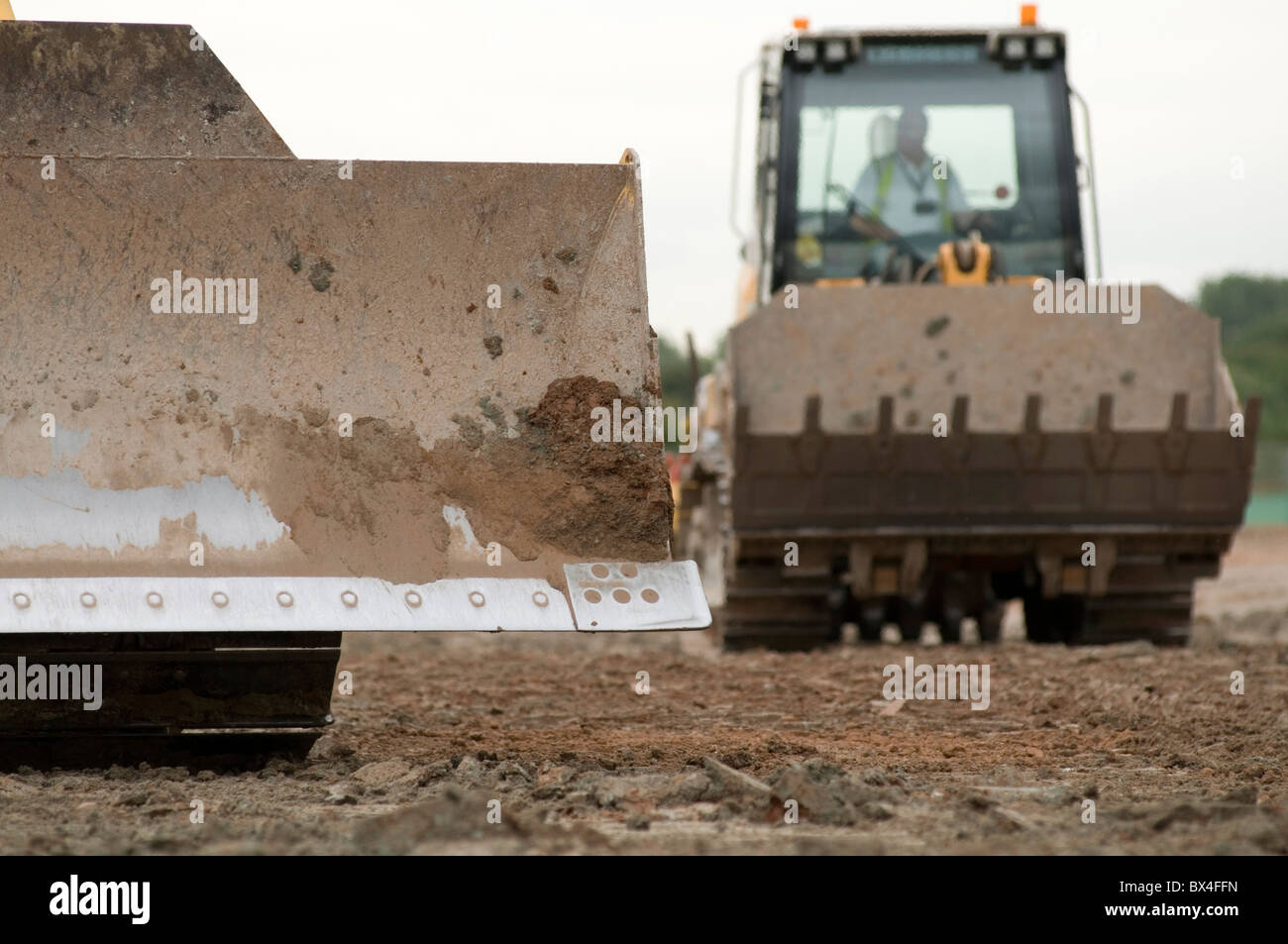 Bulldozer bulldozer digger escavatrice giallo macchina movimento terra Movimento Terra Macchine per il movimento terra noleggio della pianta della costruzione edilizia stradale sc Foto Stock