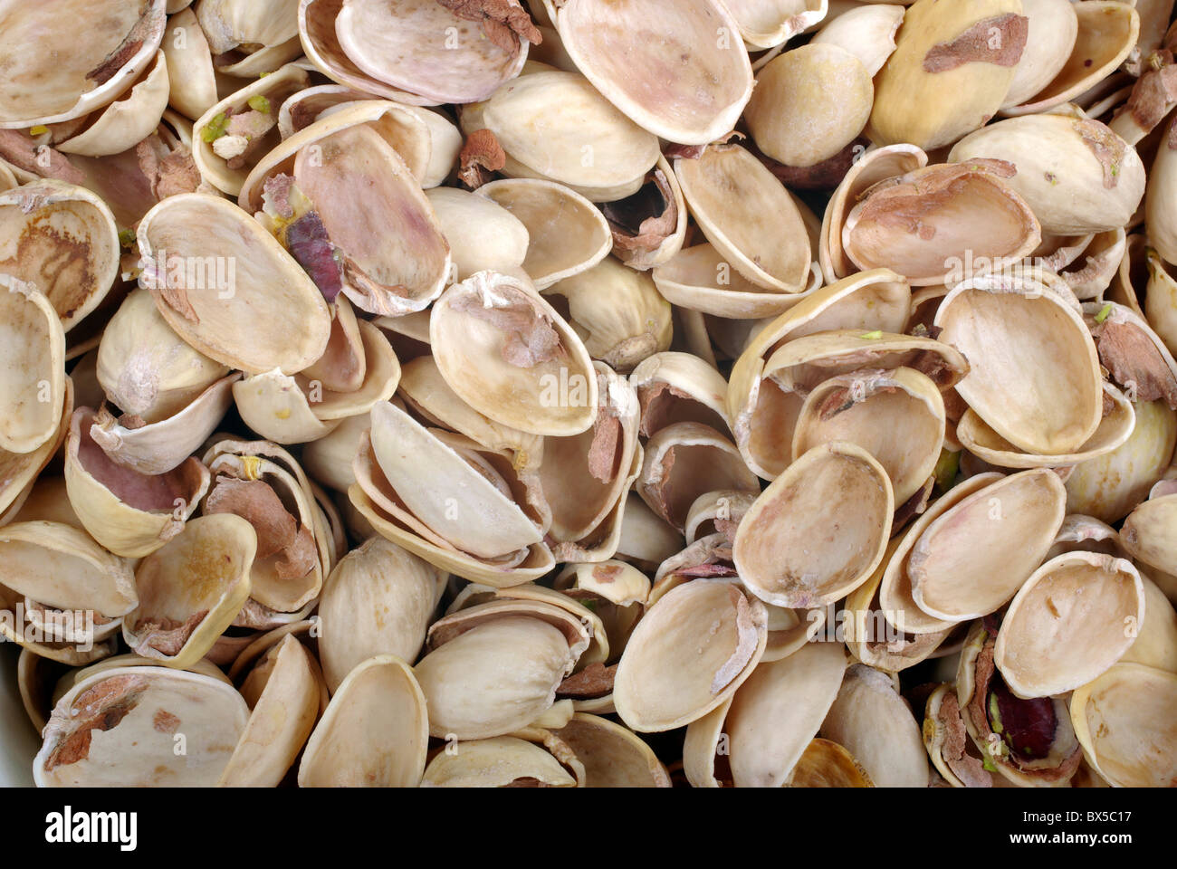 Sintesi di pistacchi full frame come sfondo. Foto Stock