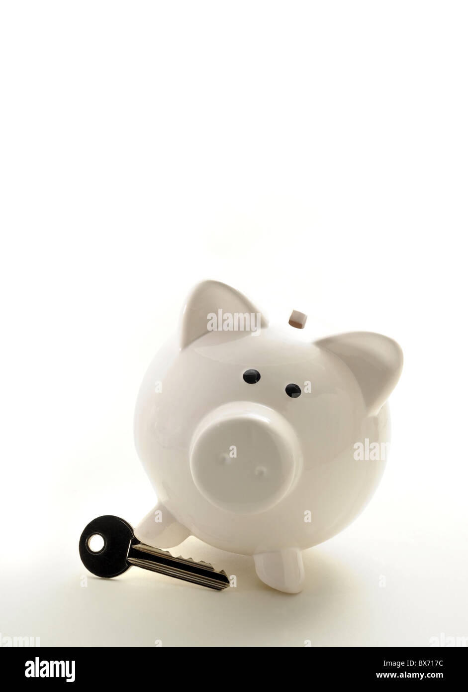 PIGGYBANK CON CHIAVE DI CASA RE gli acquirenti di case di ipoteche MERCATO IMMOBILIARE ETC REGNO UNITO Foto Stock