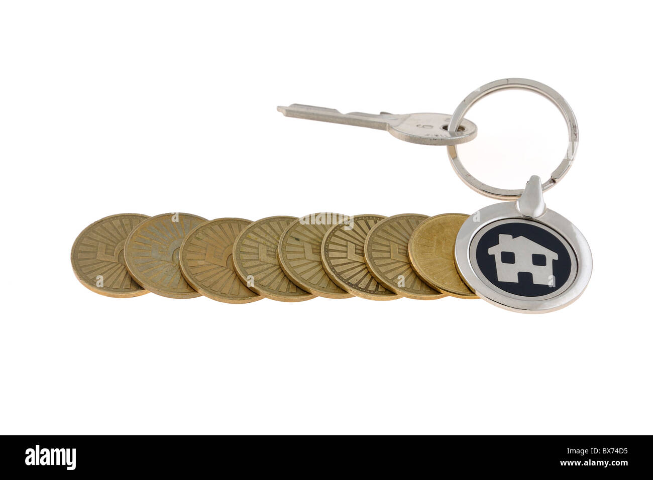 Metafora per il salvataggio con monete e casa keyring Foto Stock