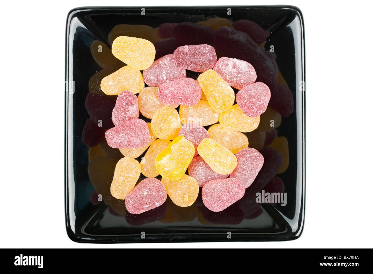 Ceramica Nera piatto server pieno di pere dolci di caduta Foto Stock