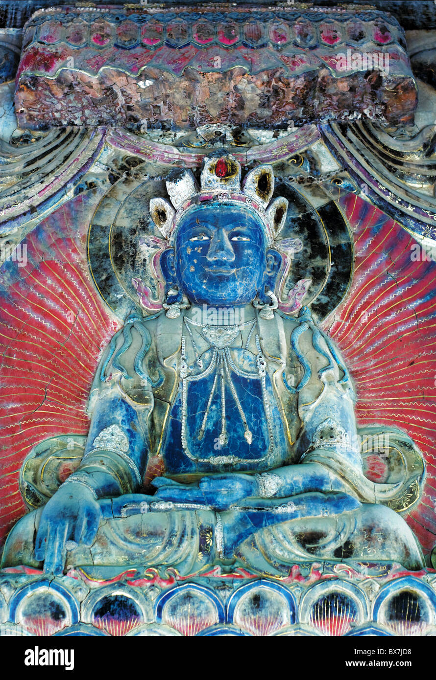 Statua di Buddha seduto in posizione illuminista. Foto Stock