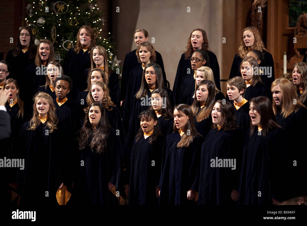 Texas Lutheran University del coro dei Vespri di Natale le prestazioni di una tradizione di Natale eseguita a Saint Martins Foto Stock