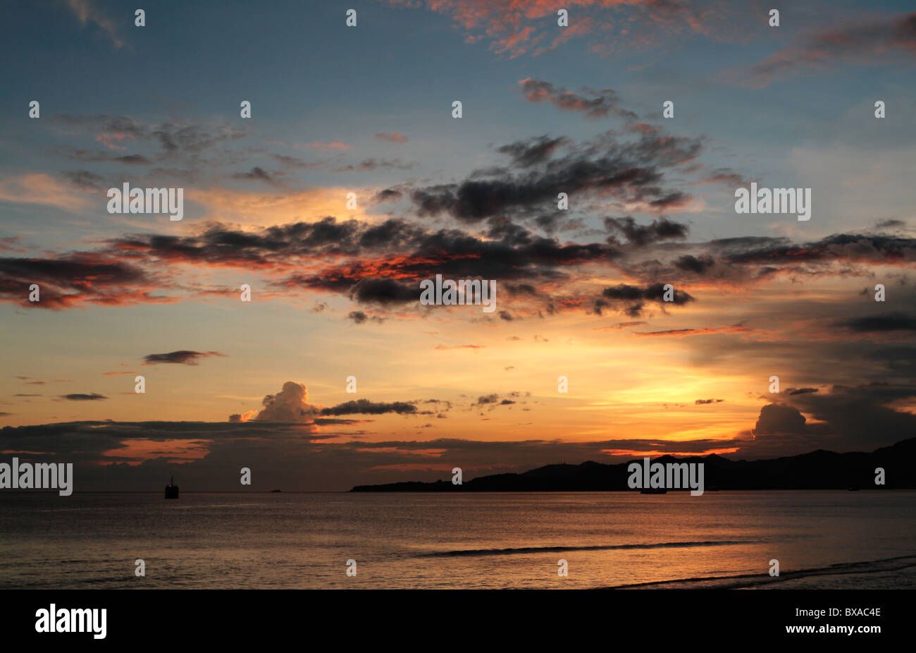 Bali tramonto da Canidasa Foto Stock