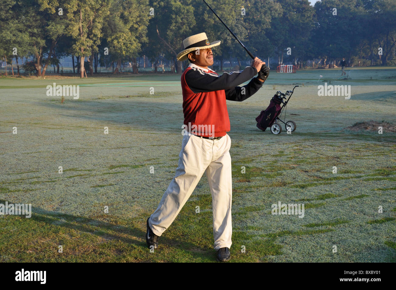 Il Golfer in azione Foto Stock