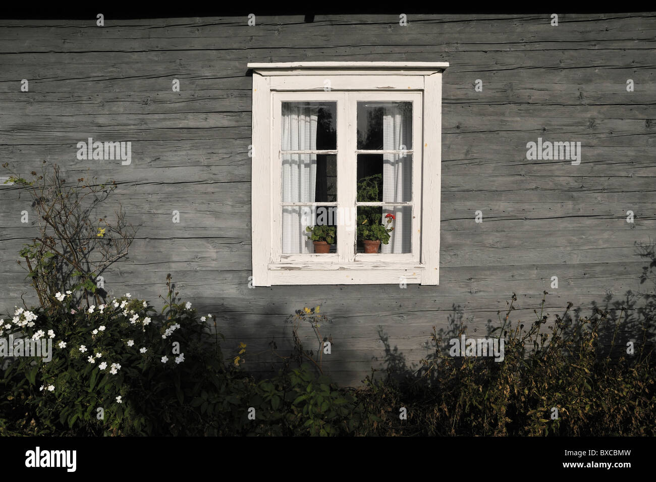 Casa in legno con thransom-finestra Foto Stock