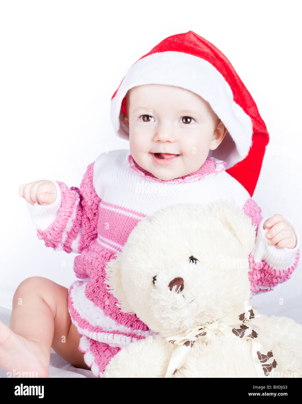 Bambino in studio contro uno sfondo bianco. Foto Stock