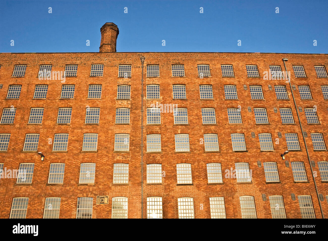 Xviii al XIX secolo Mills si affaccia Rochdale Canal, Ancoats, Manchester, Regno Unito. Ora restaurata per uso domestico e commerciale. Foto Stock