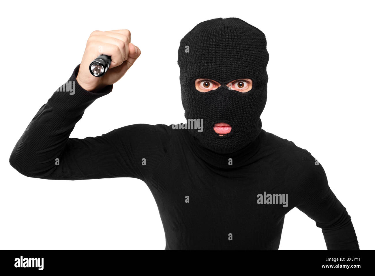 Una chiusura di un rapinatore con maschera di rapina tenendo una torcia  elettrica Foto stock - Alamy