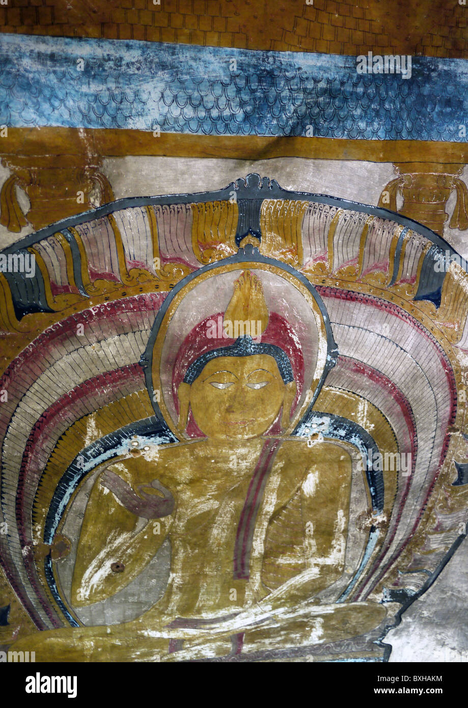 La pittura di un Buddha a Dambulla Cave templi, Sri Lanka Foto Stock