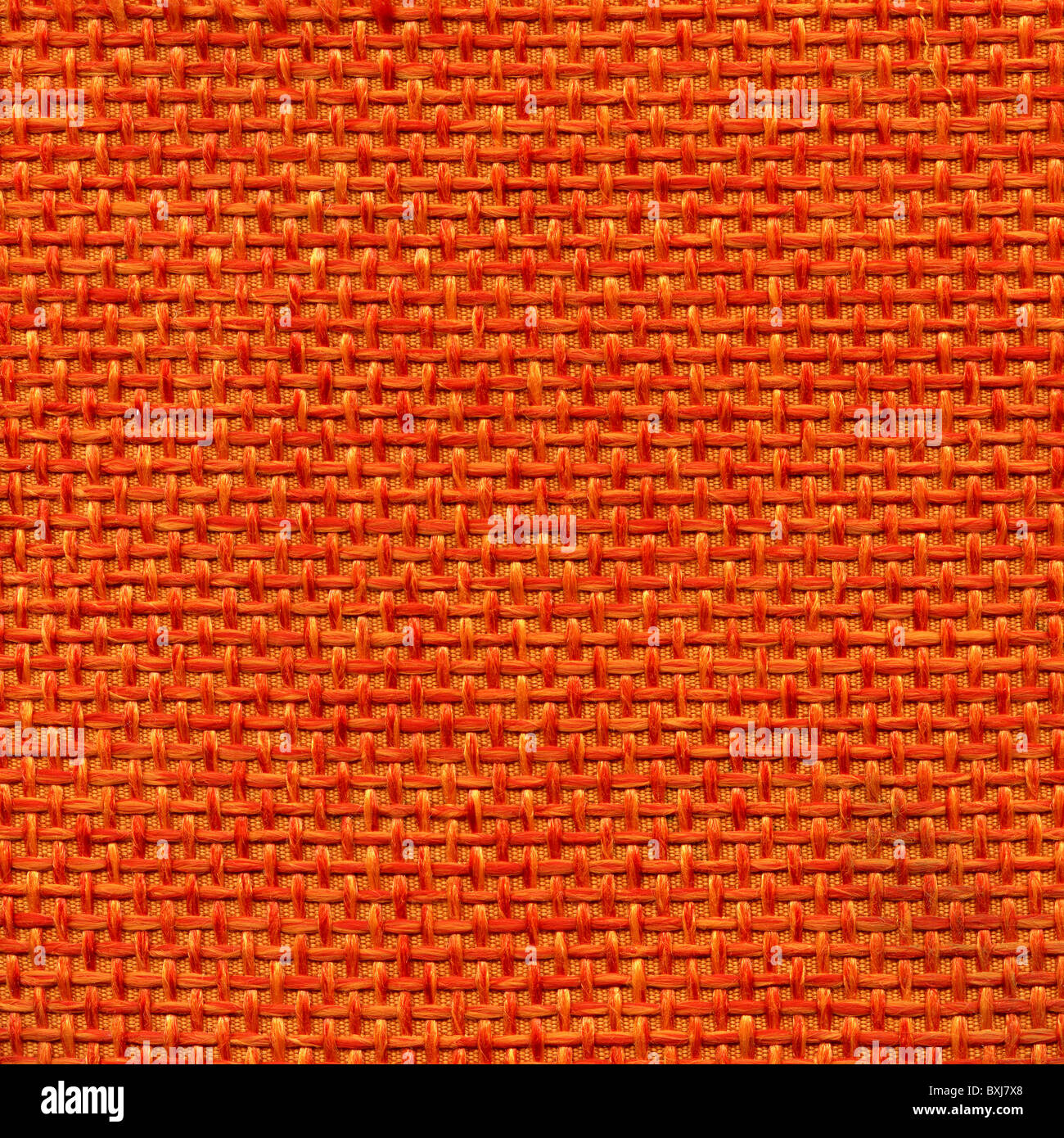 Arancione ruvida biancheria sporca a strisce di tessuto a trama Foto Stock
