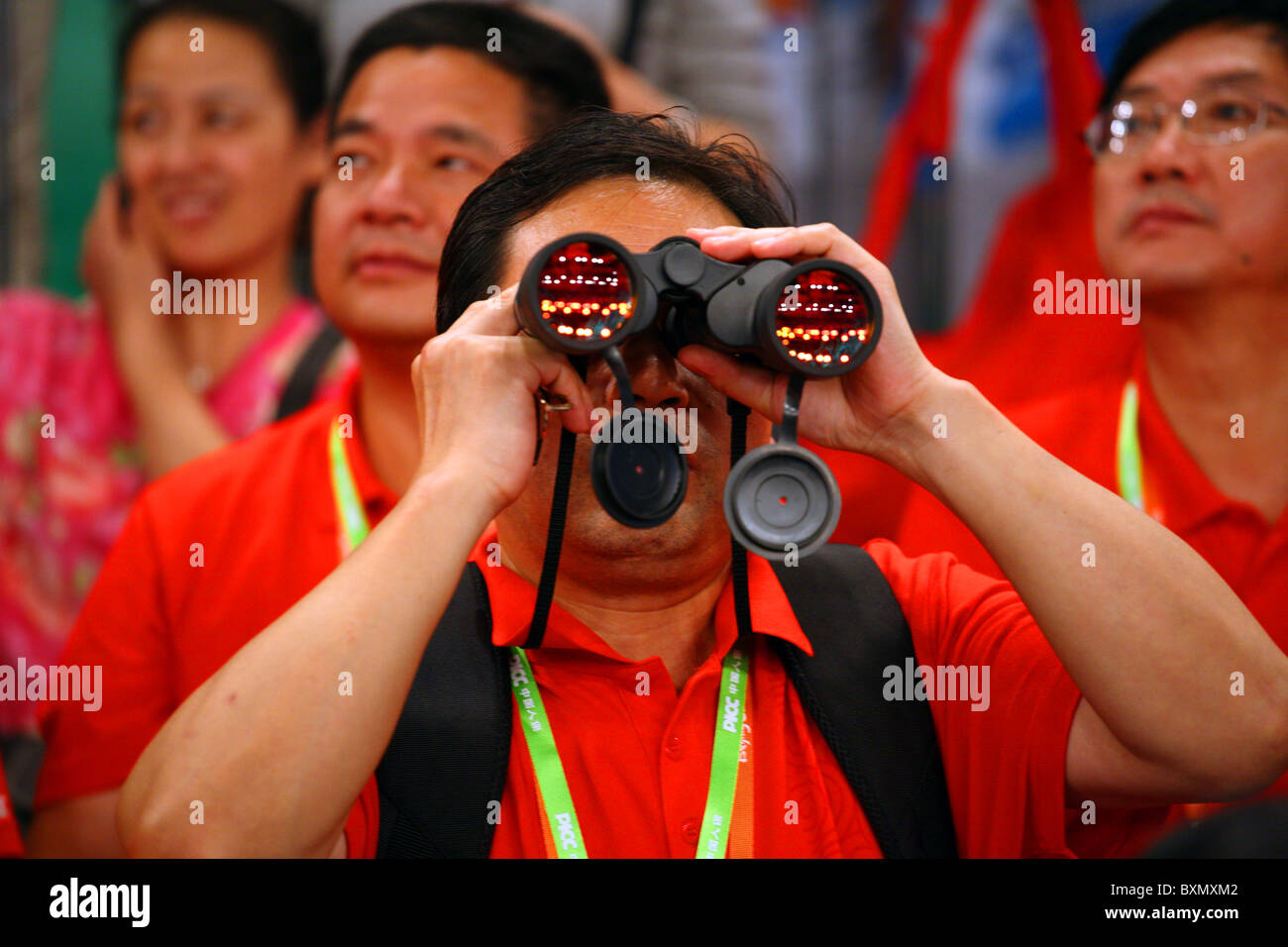 Spettatore cinese a donna partita di hockey su ghiaccio, giochi olimpici a Pechino, Cina Foto Stock