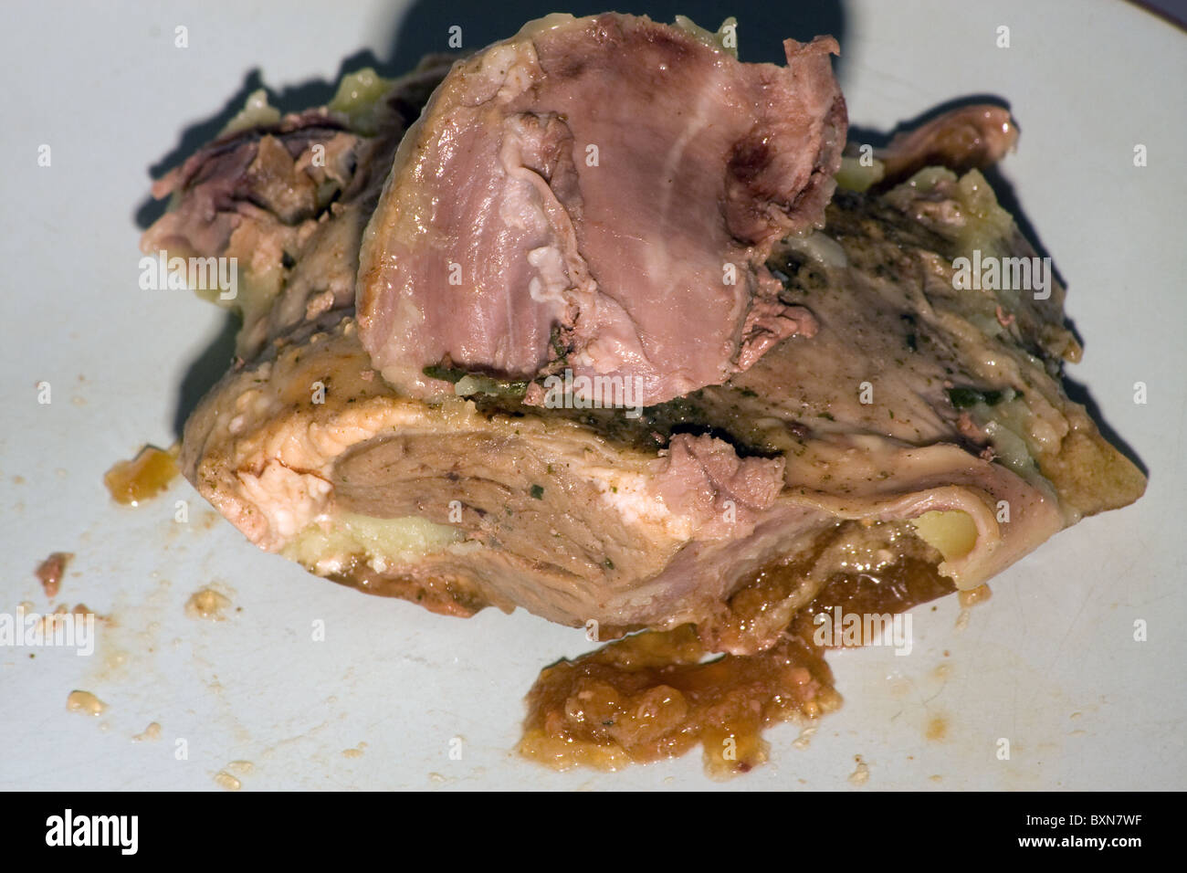 Cuocere la gamba di agnello carne grasso alimentare di midollo nutrizione Foto Stock