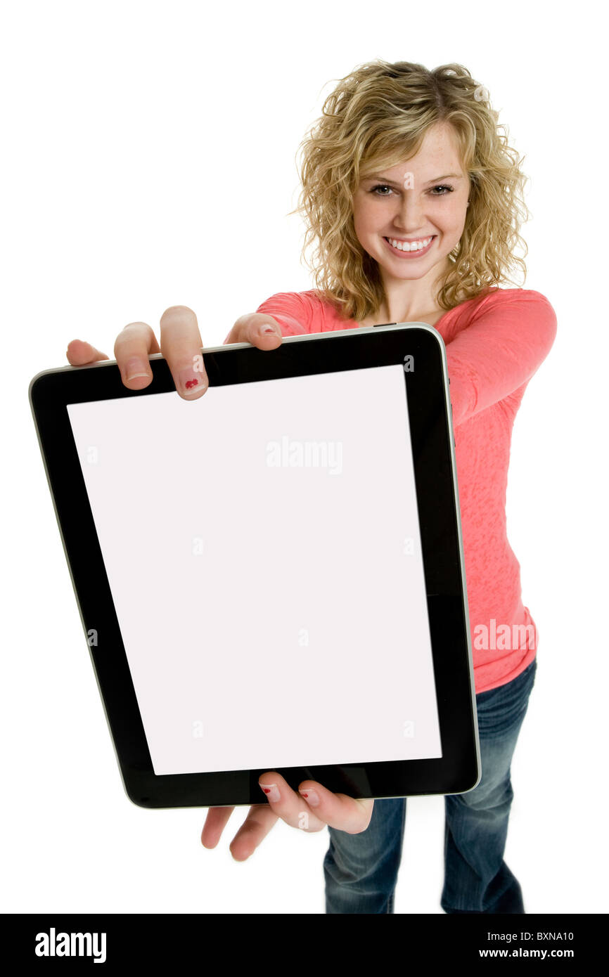 Attraente ragazza adolescente tenendo una tavoletta elettronica Foto Stock