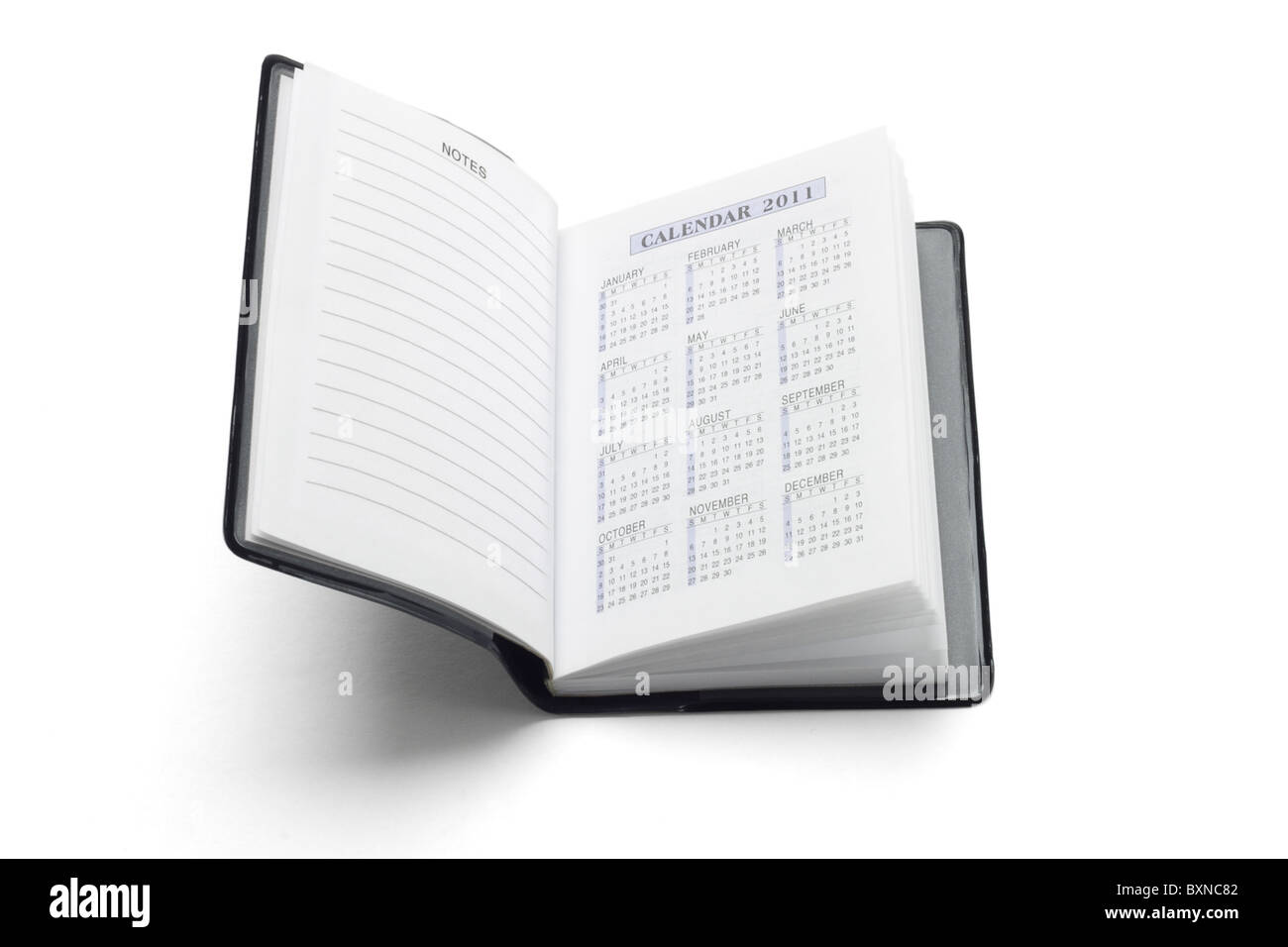 Agenda tascabile che mostra 2011 Calendario su sfondo bianco Foto Stock