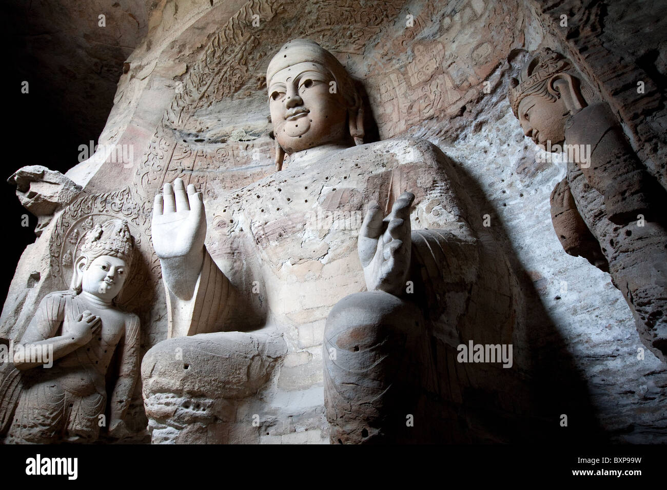 Grotta numero 4, Yungang Grotto, Cloud Ridge Grotta, buddista sculture in pietra, Northern Wei periodo, di Datong, Cina - mani mostrano nessuna paura Foto Stock