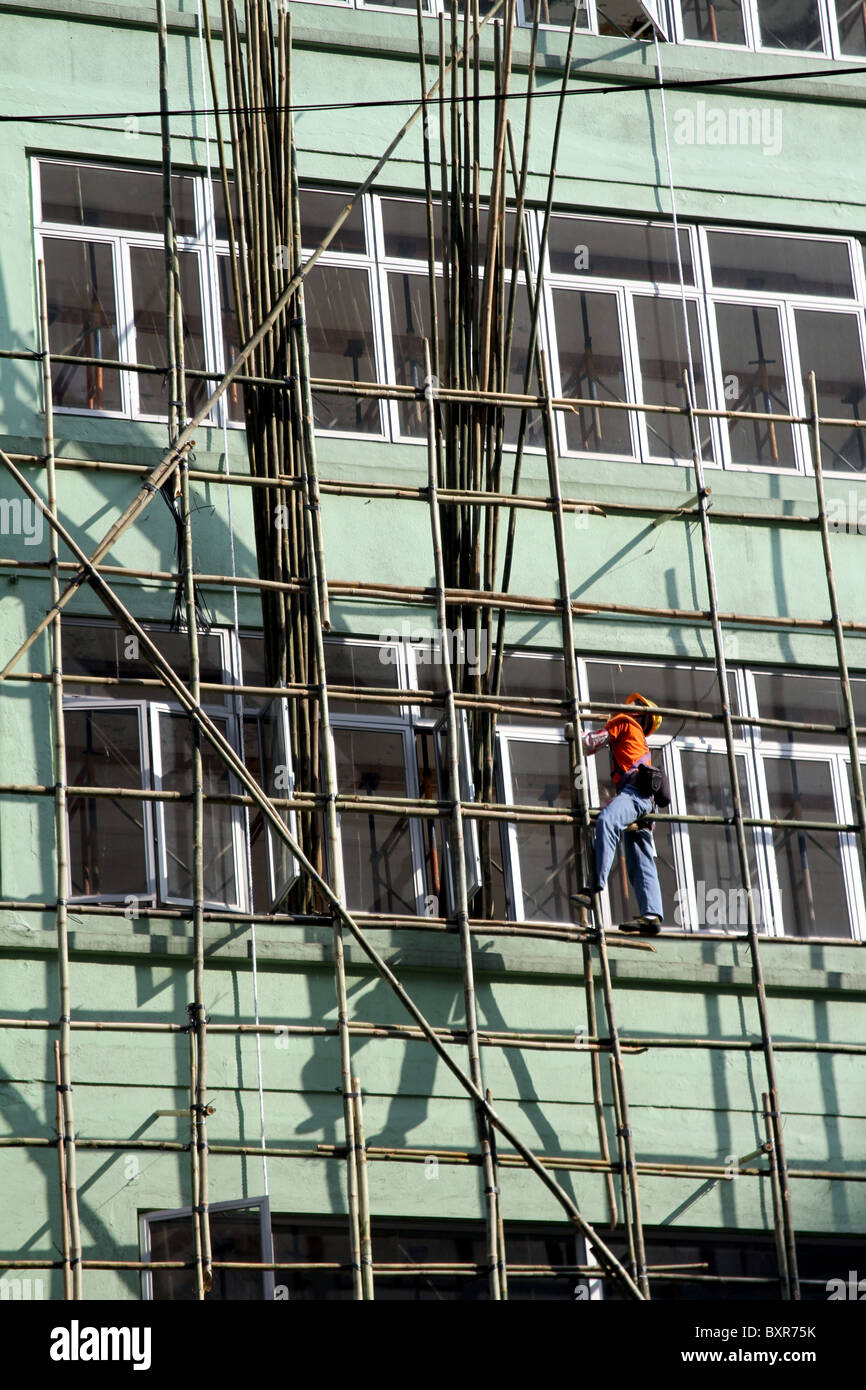Il bambù ponteggi utilizzati in edilizia e costruzione di Hong Kong, Cina Foto Stock