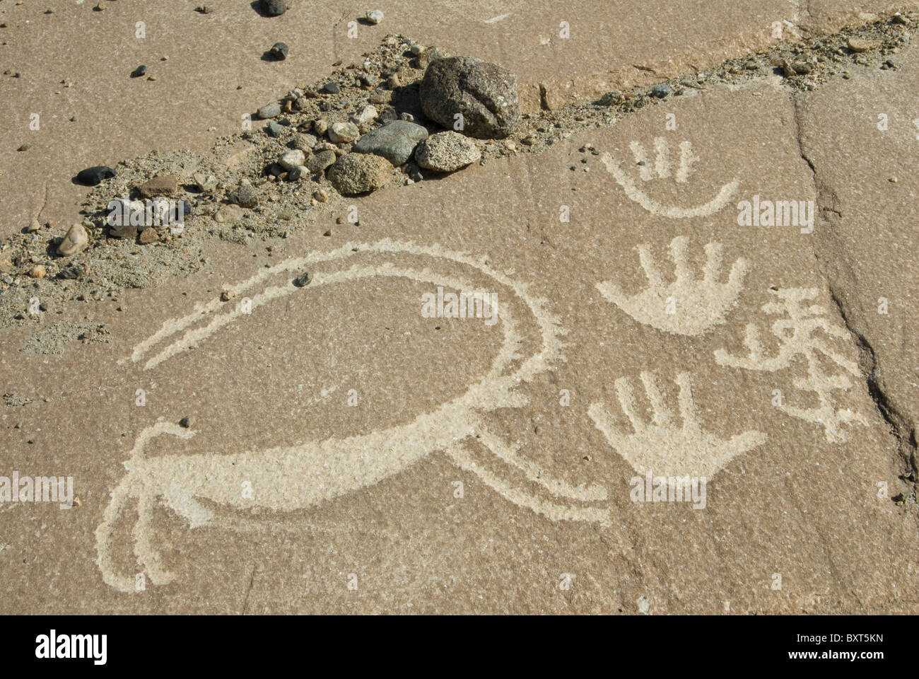 Incisioni rupestri di arte tribale trovato nel Wakhan corridoio vicino al Langar, Tagikistan Foto Stock