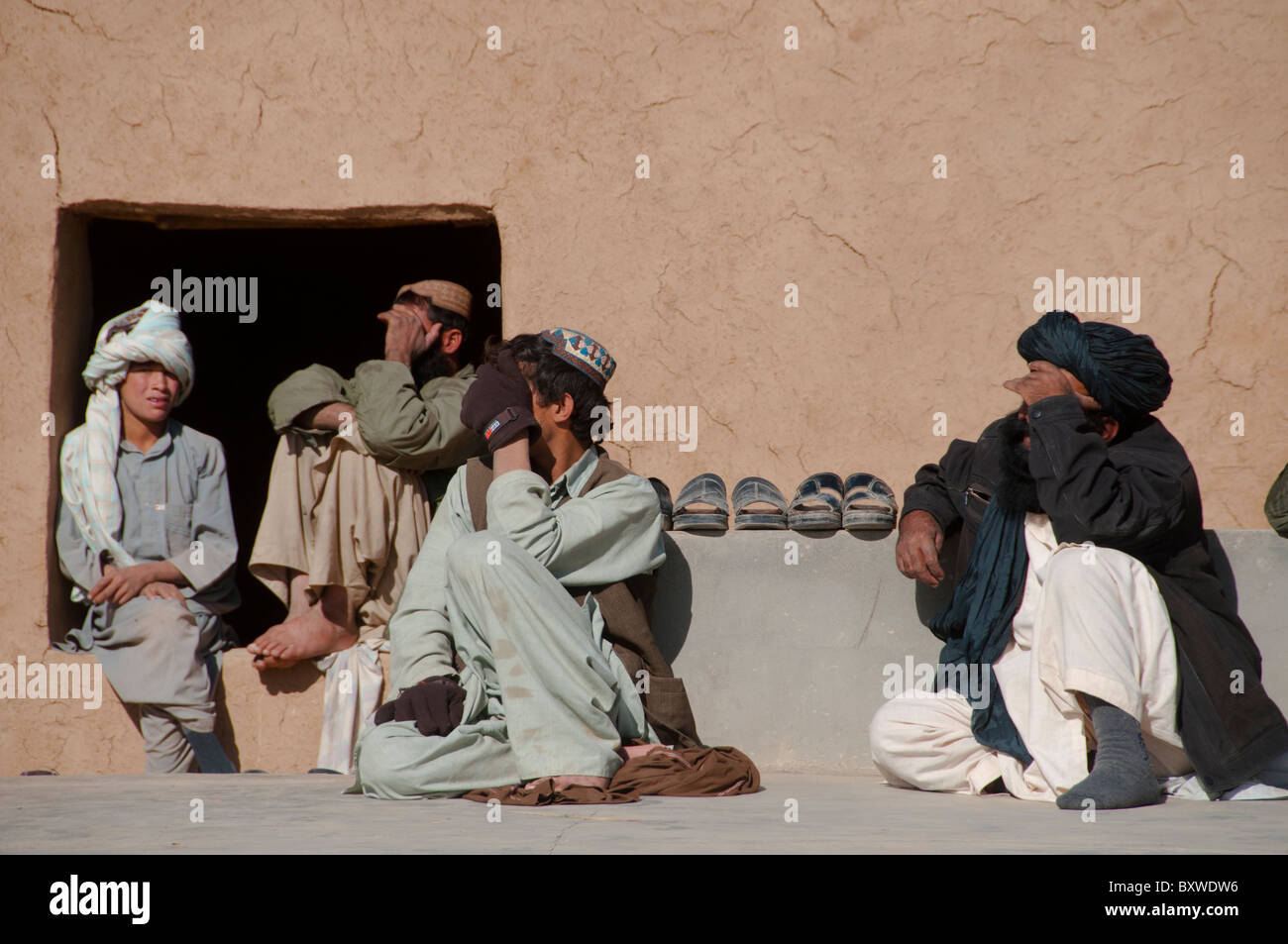 Pushtun uomini alla riunione in Helmand in Afghanistan Foto Stock