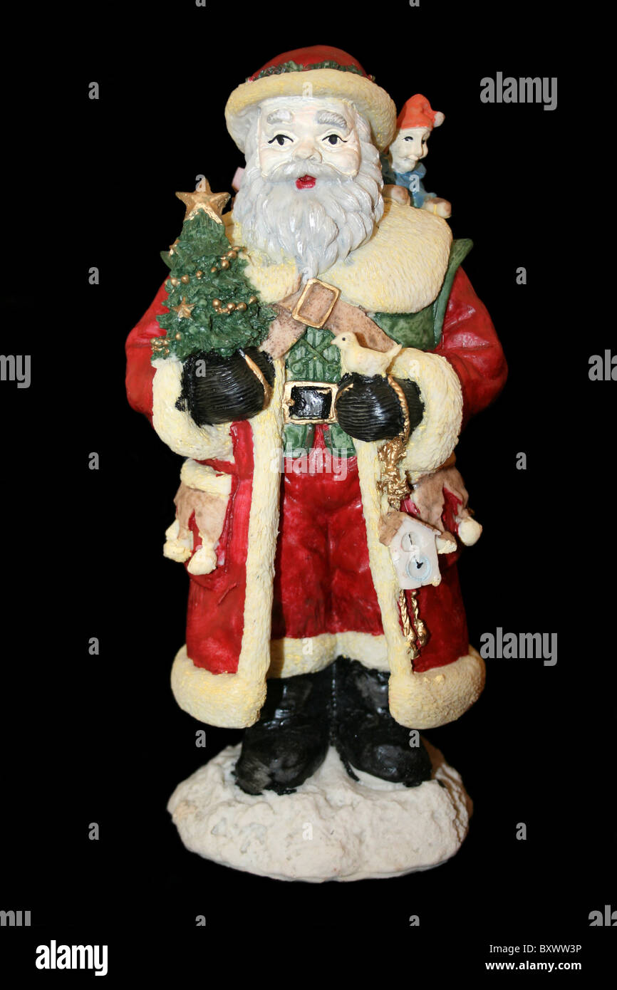 Tradizionale Babbo Natale natale decorazione su sfondo nero Foto Stock