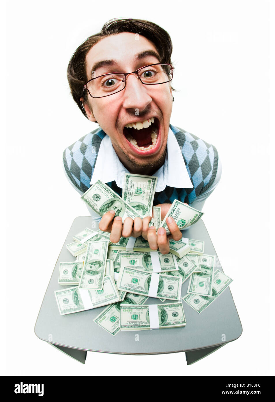 Ritratto di uomo ricco rastrellamento in dollari americani con espressione soddisfatta Foto Stock