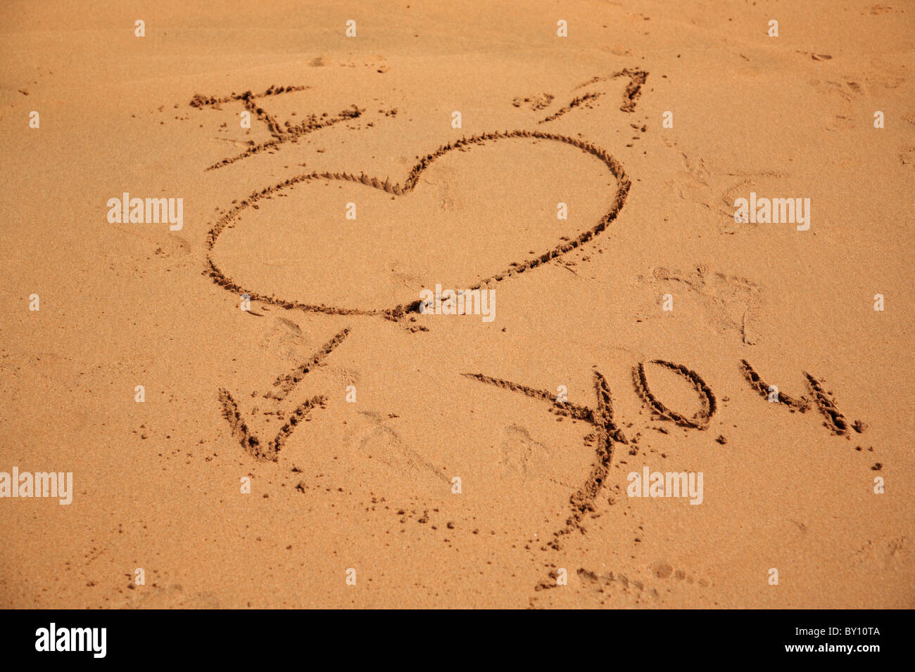 Scritta I love you sulla sabbia Stock Photo