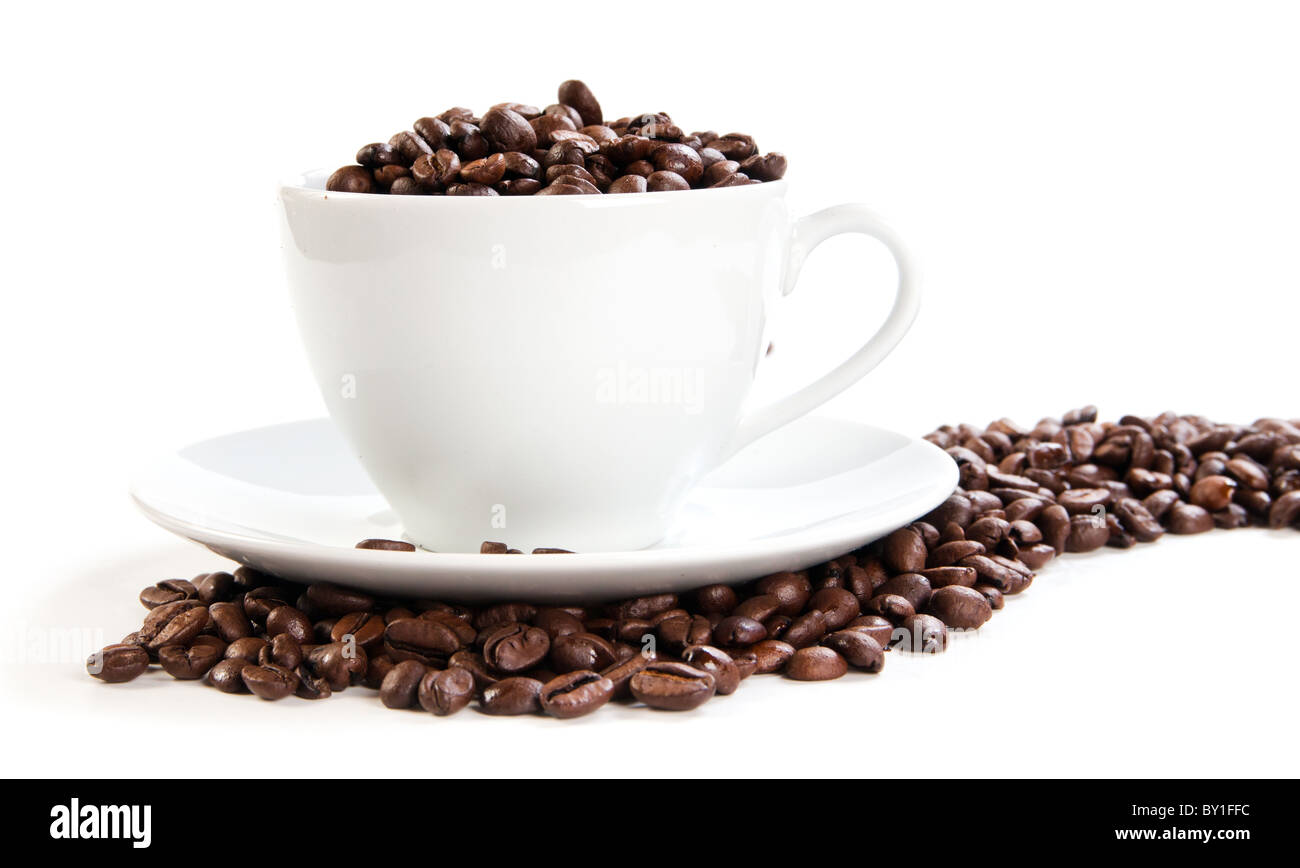 Coppa piena di chicchi di caffè Foto Stock