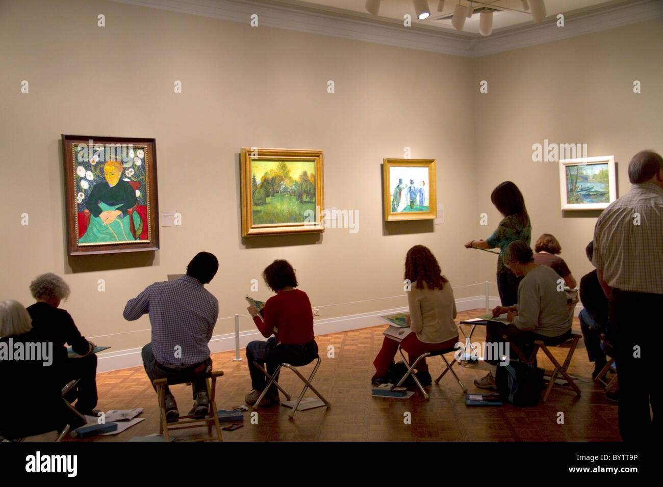 Gli studenti di arte copia dipinti esposti presso l'Art Institute of Chicago, Illinois, Stati Uniti d'America. Foto Stock