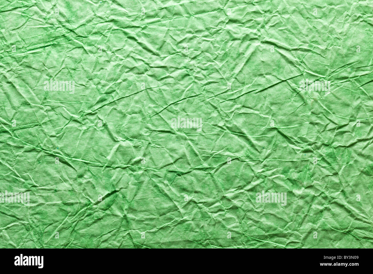 Immagine di tessitura accartocciata carta verde. Foto Stock