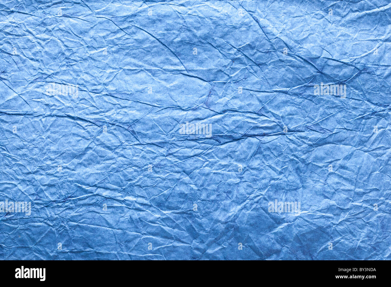 Struttura di immagine di accartocciata carta blu. Foto Stock