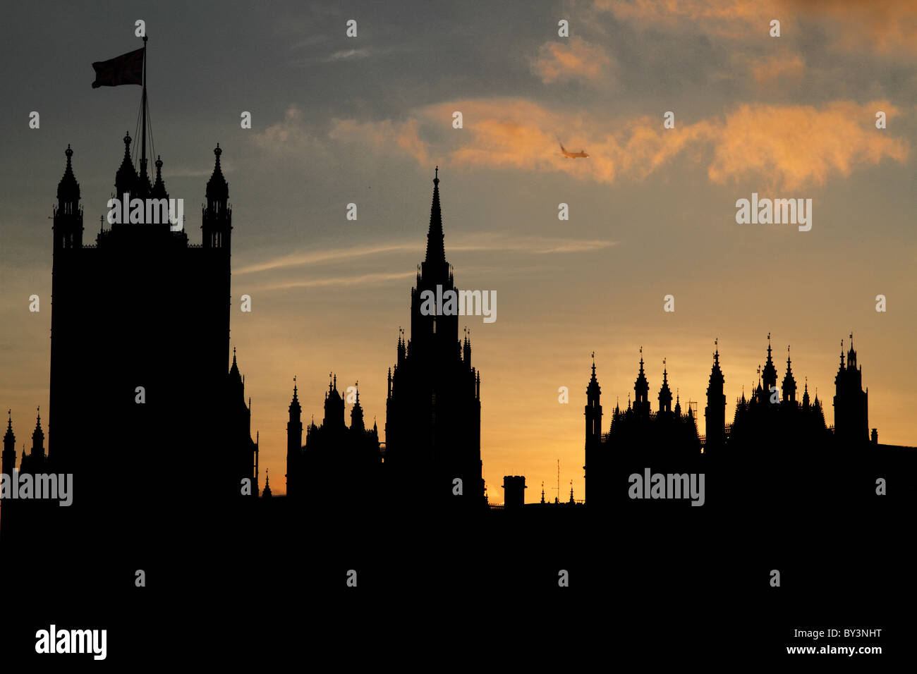 Case del Parlamento tramonto silhouette London Thames Westminster Foto Stock