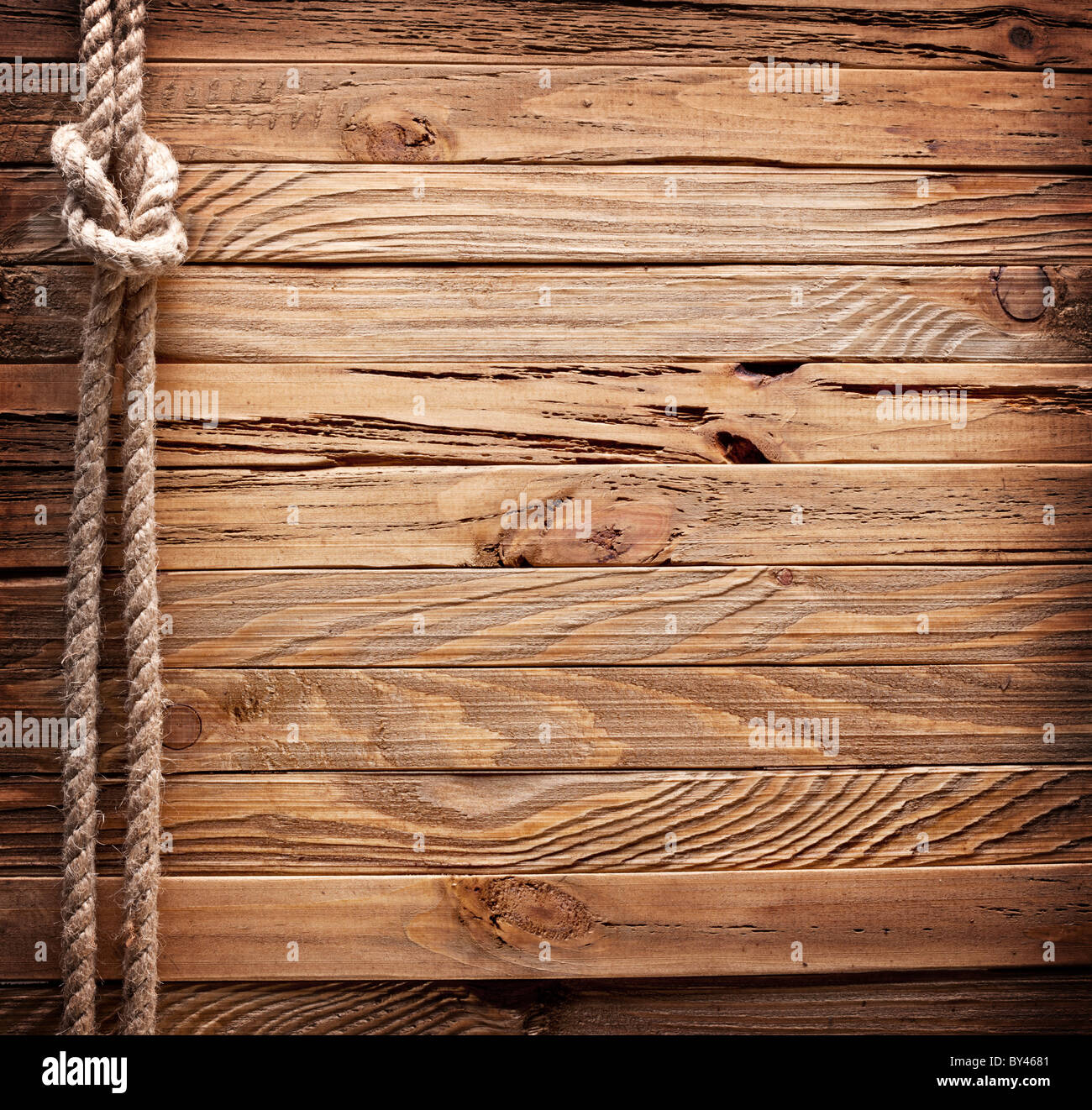 Immagine di un vecchio texture di assi di legno con nave corda. Foto Stock Immagine di un vecchio texture di assi di legno con nave corda. Foto Stock