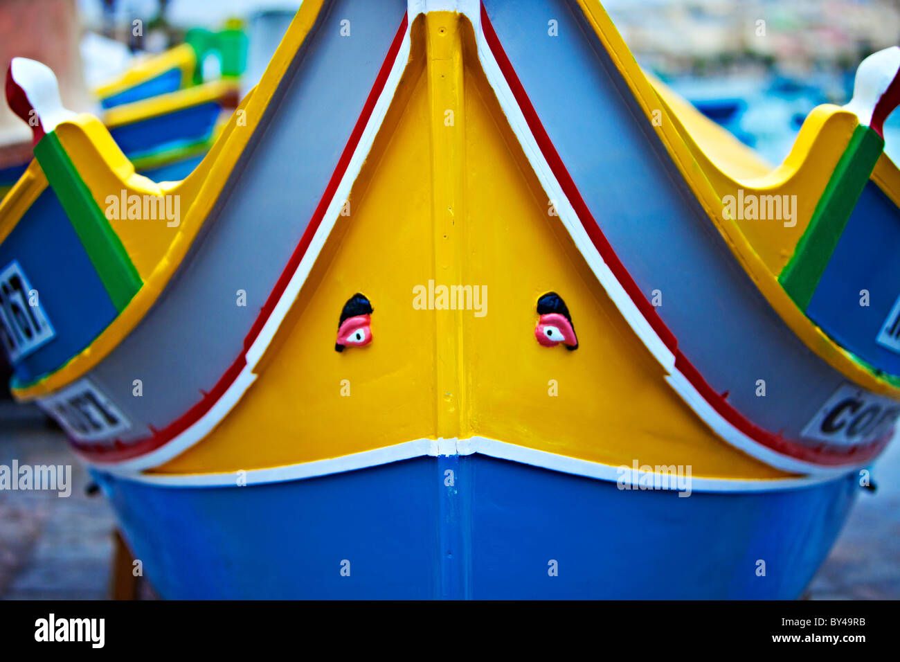 Il villaggio di Marsaxlokk barca MALTA LUZZUS male gli occhi Foto Stock