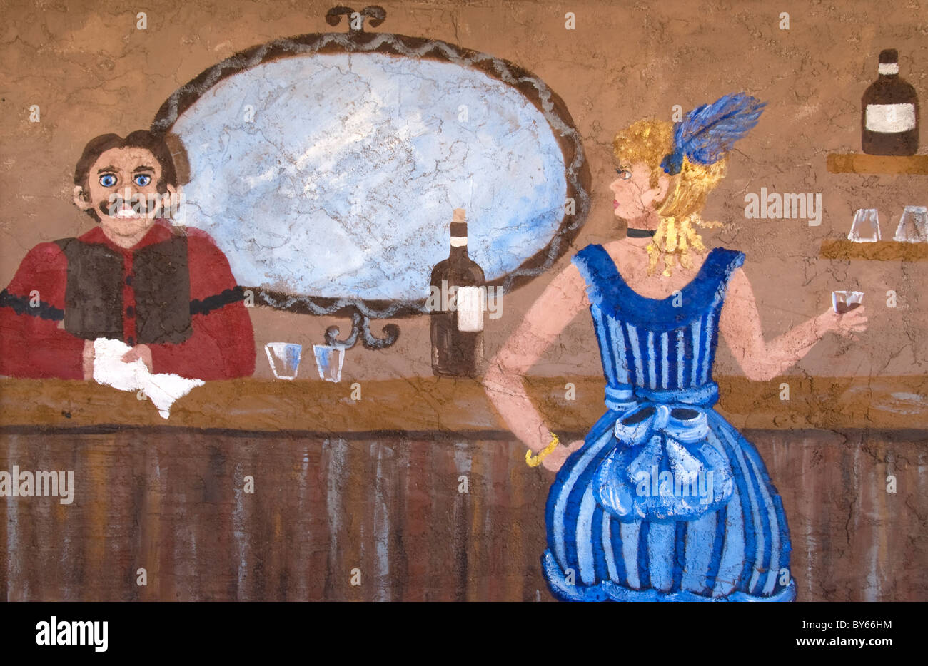 Western Saloon gal e il barista. Foto Stock