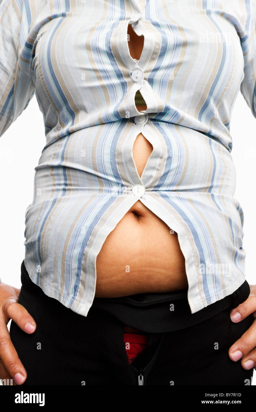 Maglietta stretta sul sovrappeso corpo femmina, preso da vicino Foto stock  - Alamy