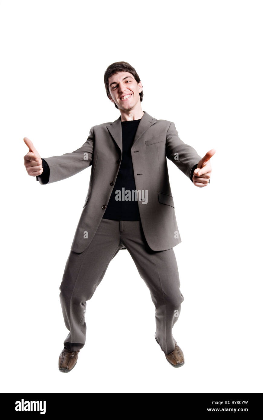 Giovane uomo d affari dando pollice in alto Foto Stock