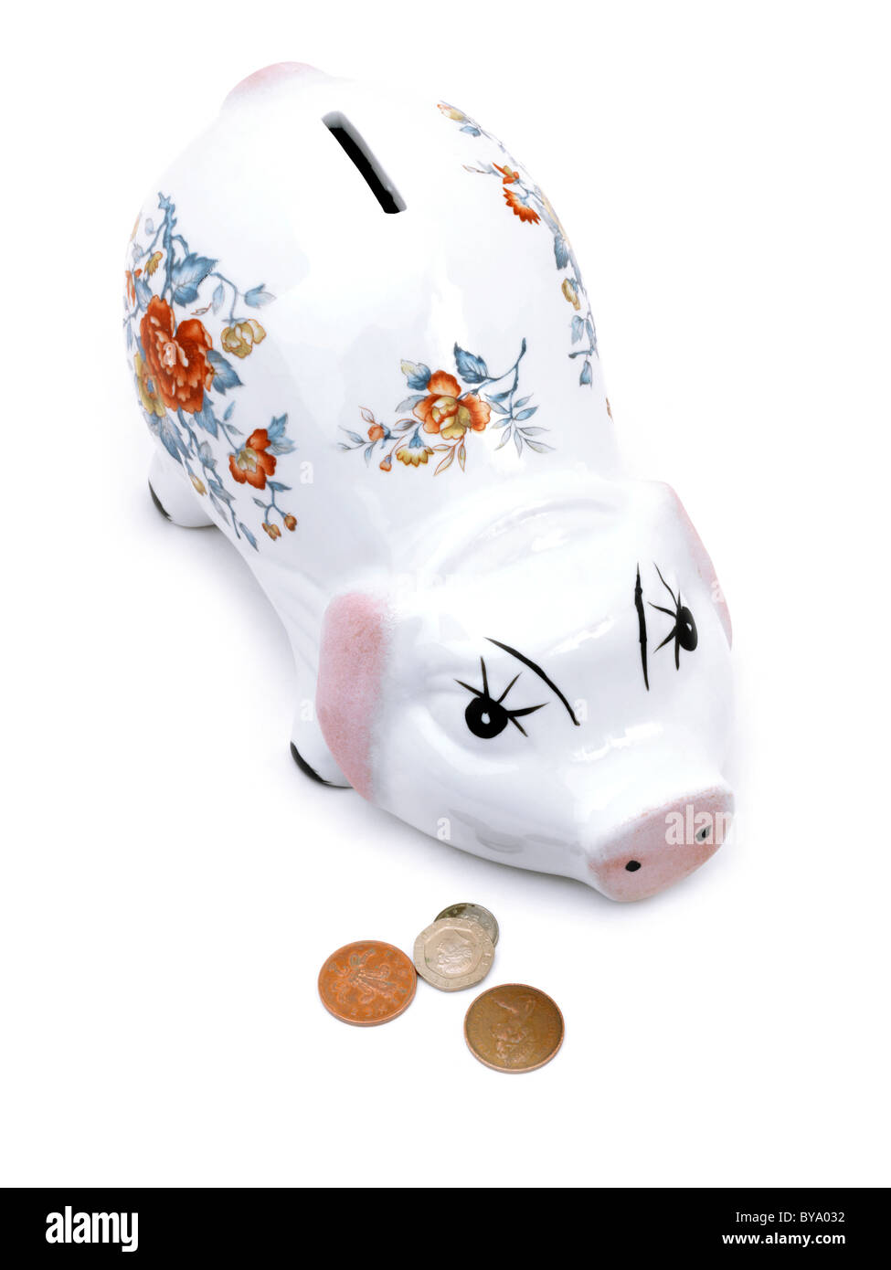 Floral Salvadanaio e monete Foto Stock