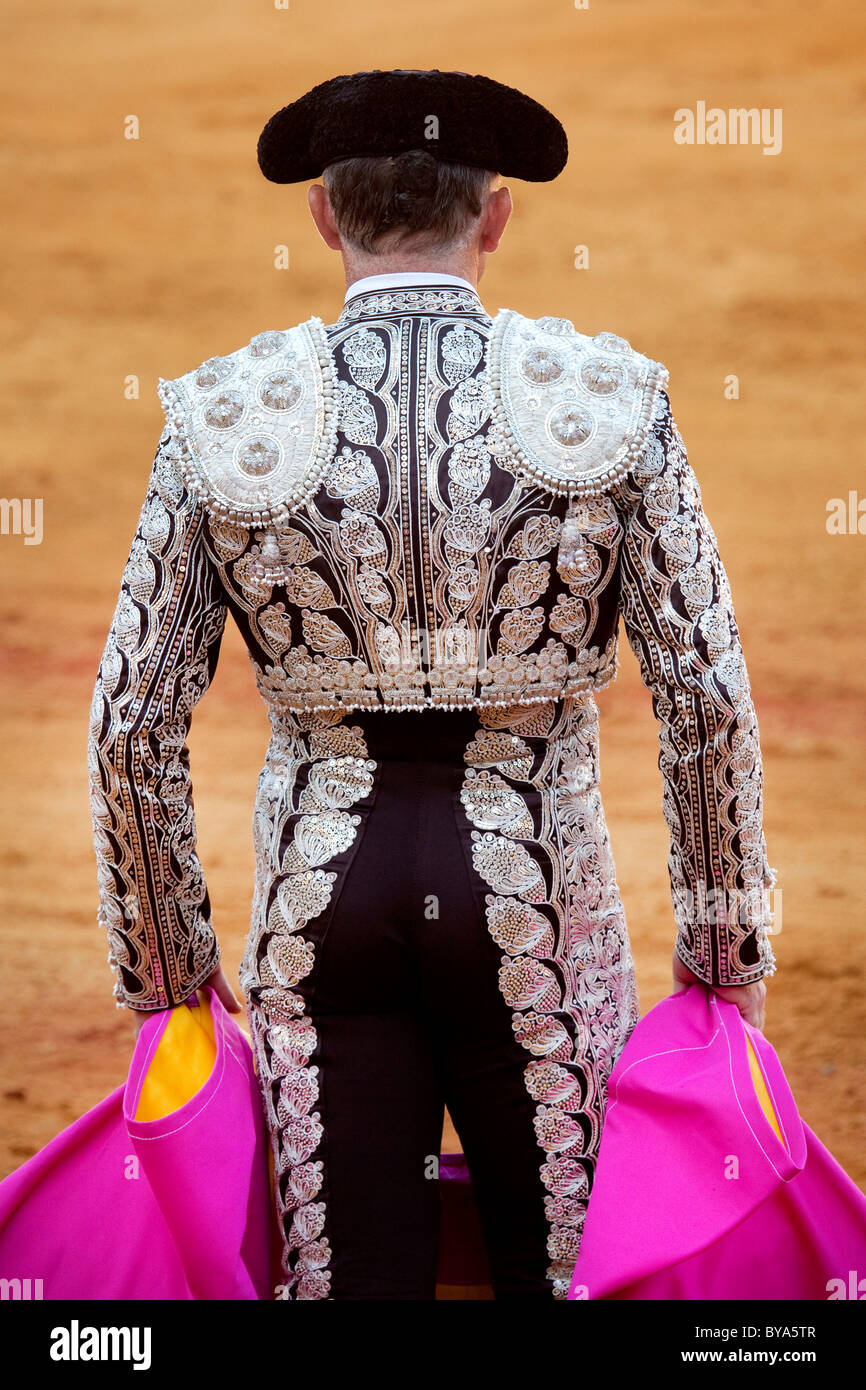 Torero, Matador in costume da dietro, la Plaza de Toros de la Maestranza Bull Ring, Siviglia, in Andalusia, Spagna, Europa Foto Stock