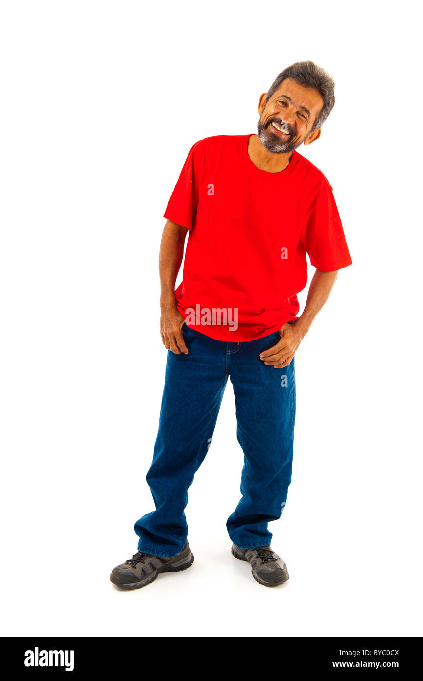 Uomo sorridente con le sue mani in tasca dei pantaloni Foto Stock