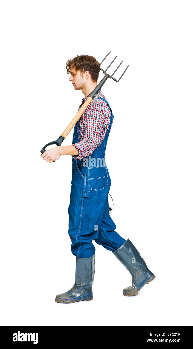 Studio shot del contadino con forcone Foto Stock