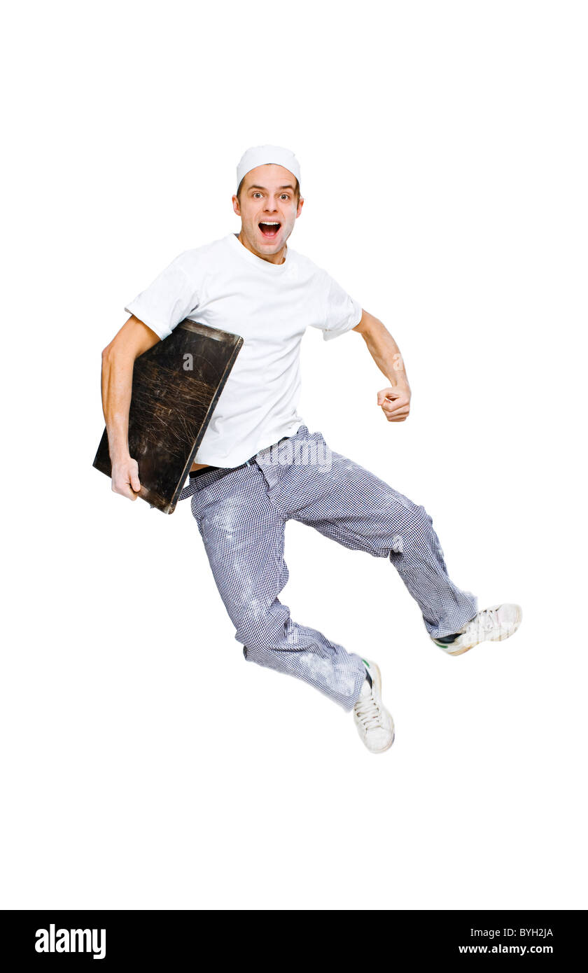 Studio shot di baker jumping Foto Stock