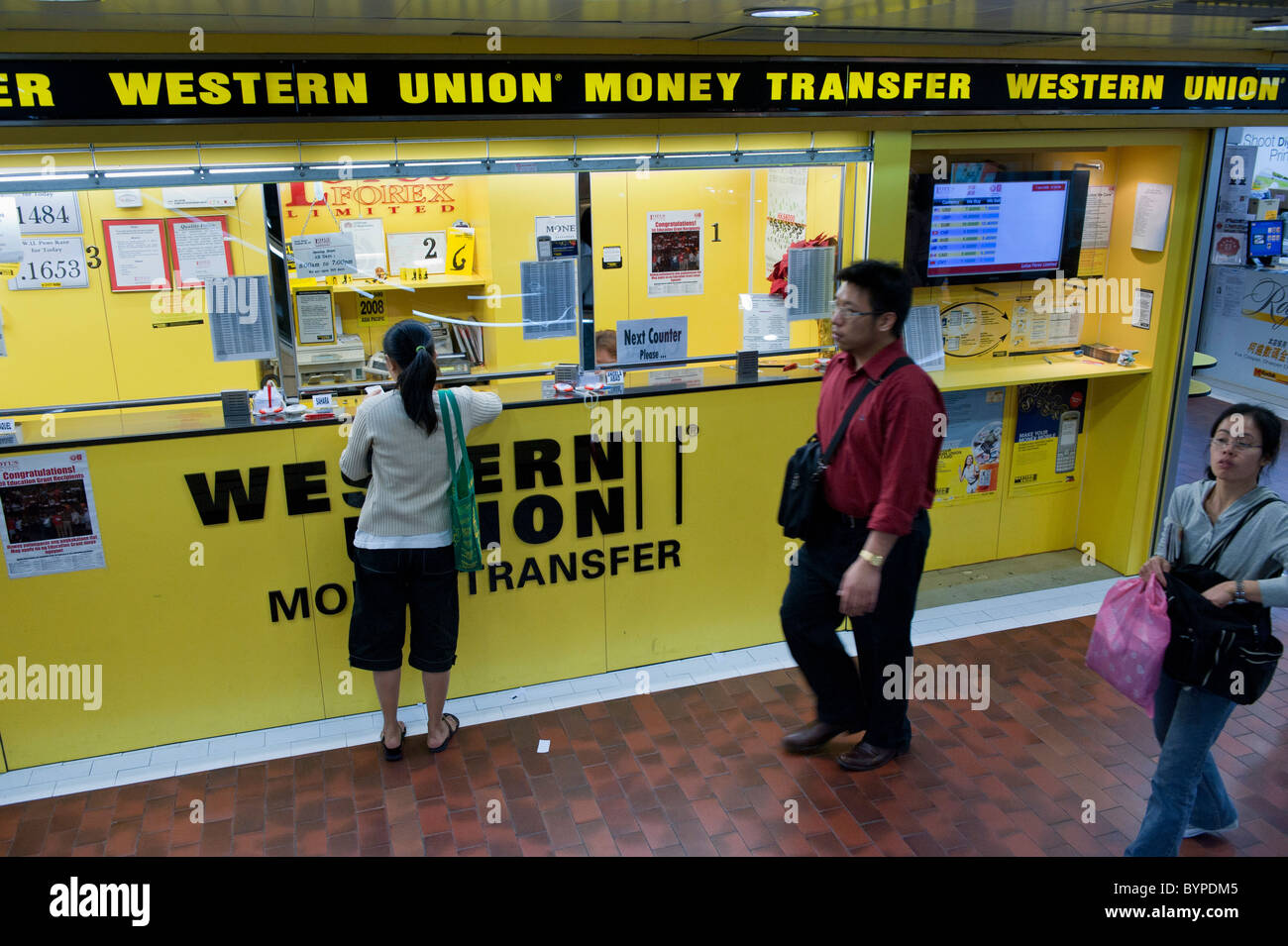 La Western Union per i trasferimenti di denaro. Ampiamente usato in Hong Kong dal filippino, cameriere. Foto Stock