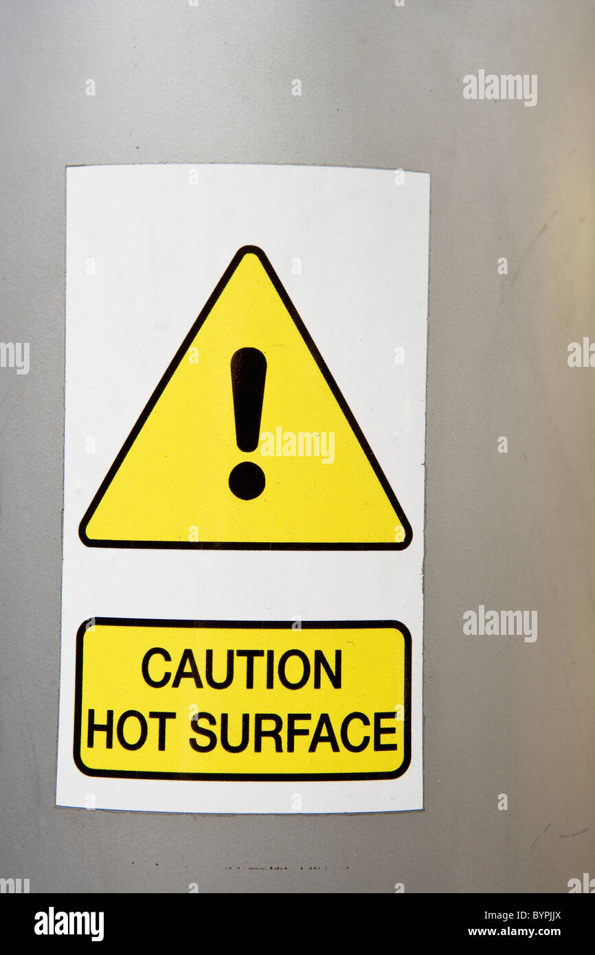 Il simbolo di attenzione annunciando la superficie calda Foto Stock